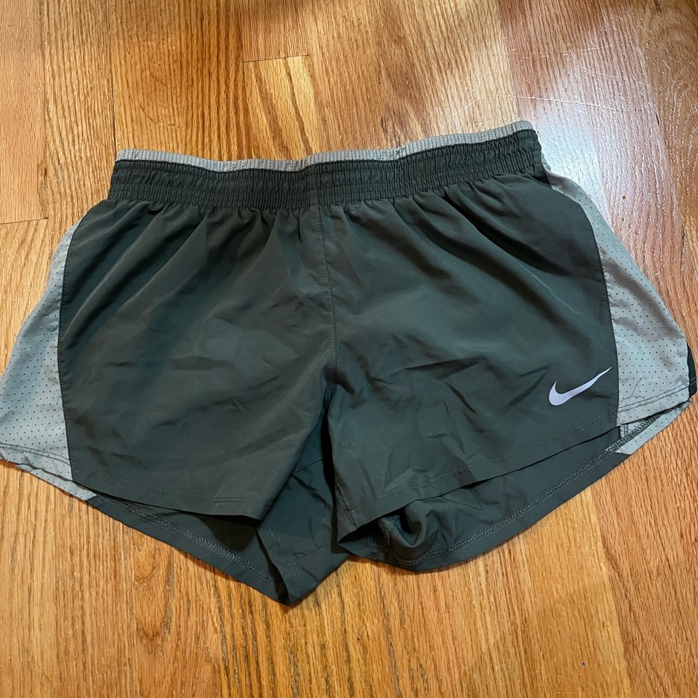 Green Nike Dri-Fit running shorts